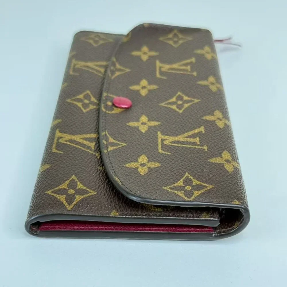 Louis Vuitton Monogram Canvas Wallet with Classic LV Pattern and Red Button
